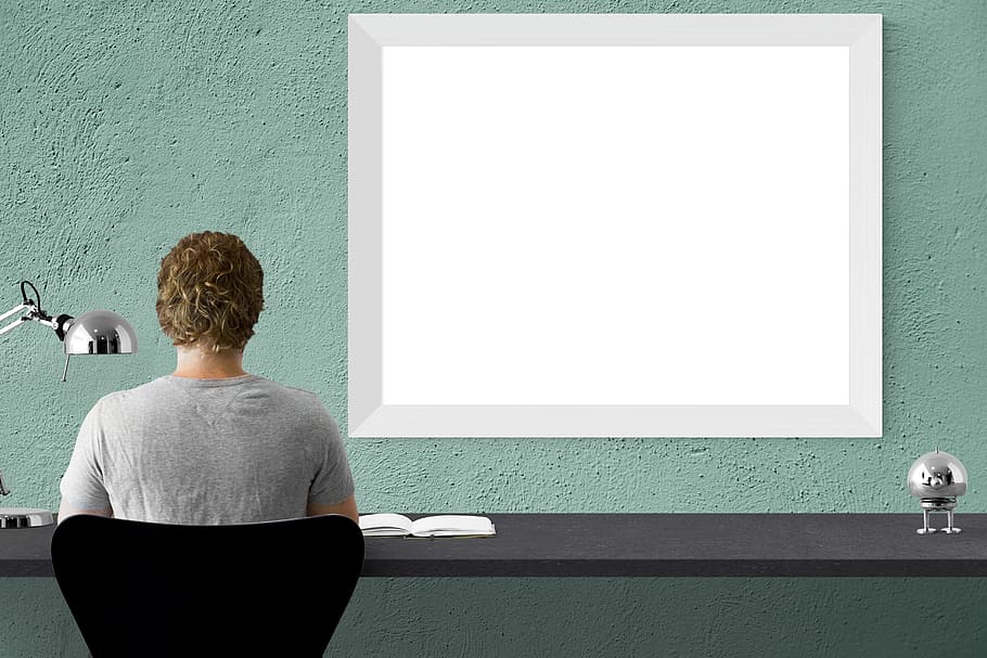 person sitting on black chair in front of desk, mockup, wall HD wallpaper