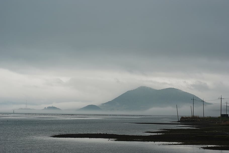 sea, beach, fog, rain cloud, sky, ocean, mountain, cloud - sky HD wallpaper