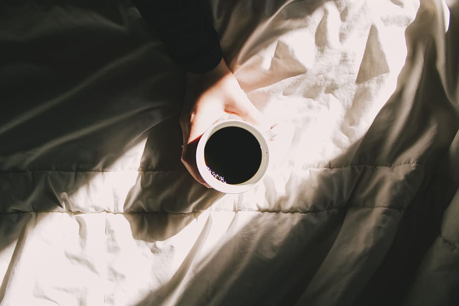 person holding white mug, bed, coffee, cup, hand, sunlight HD wallpaper