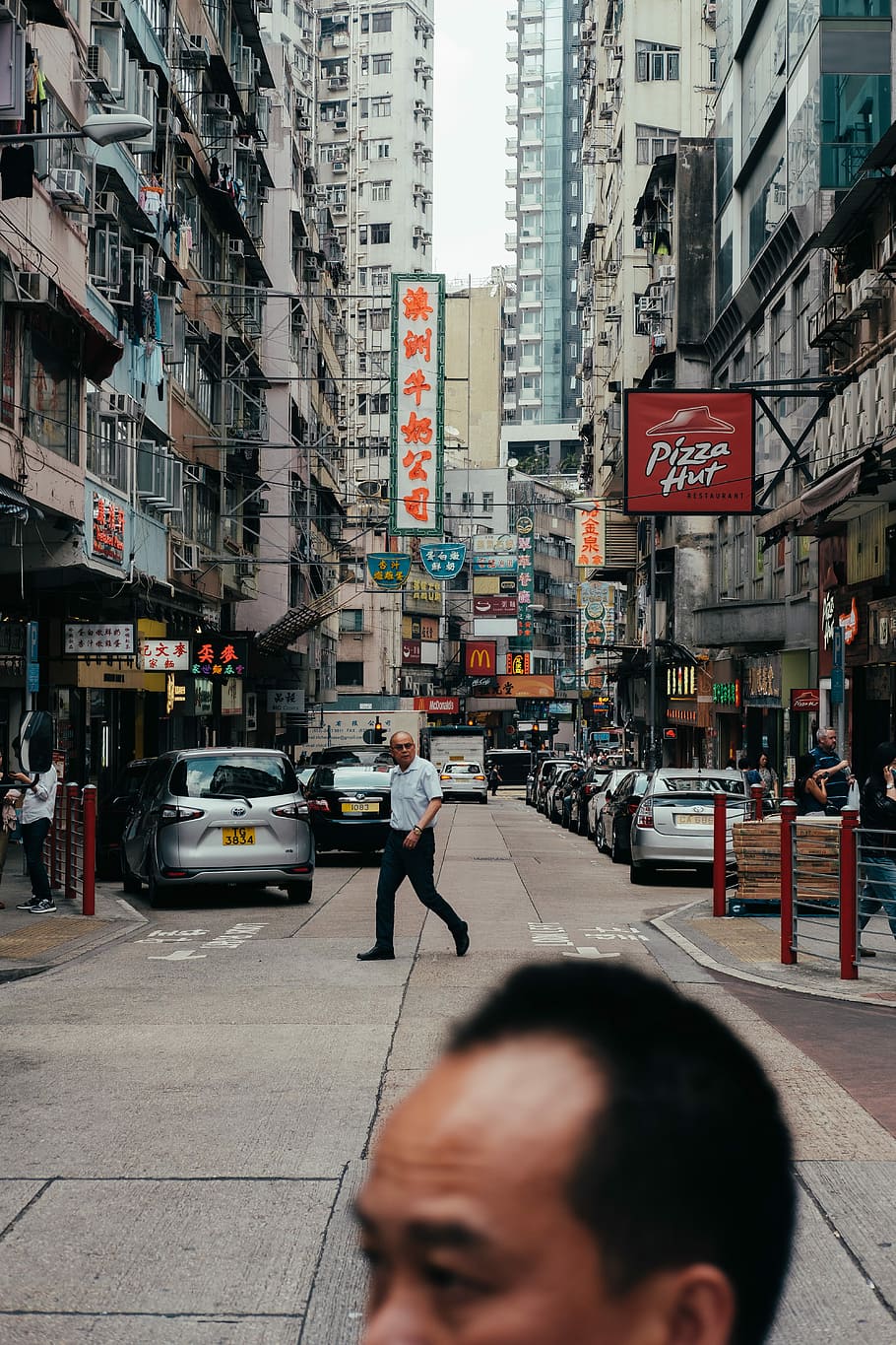 man in white shirt standing near gray car, tourist, touism, person, HD wallpaper