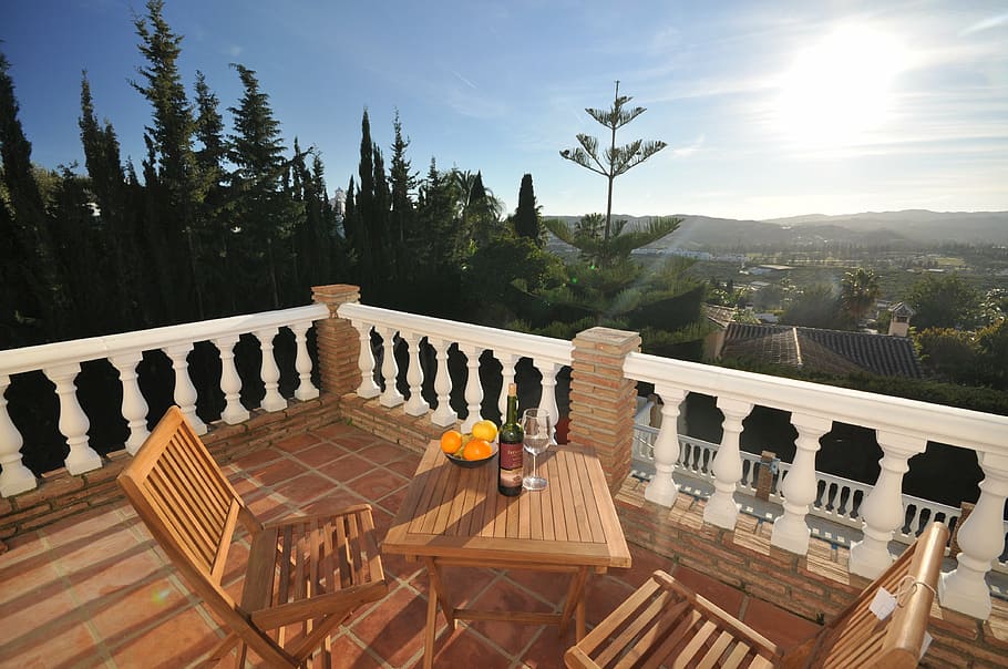green liquor bottle on top of brown wooden patio table, balcony HD wallpaper