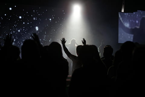 crowd of people inside room dancing while watching person singing, silhouette of peoples watching musical band during nighttime HD wallpaper