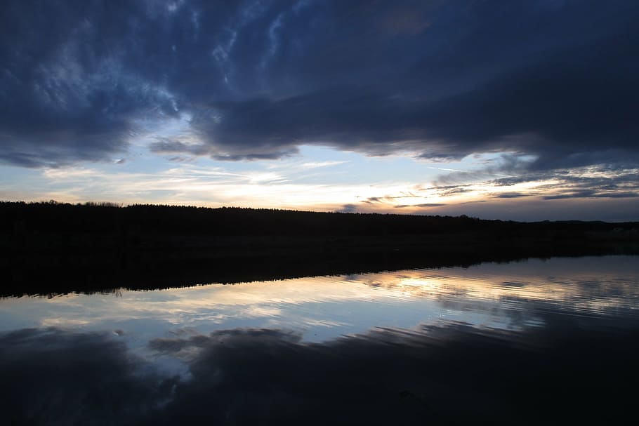 body of water under cloudy sky, clouds, reflection, blue, dark clouds HD wallpaper