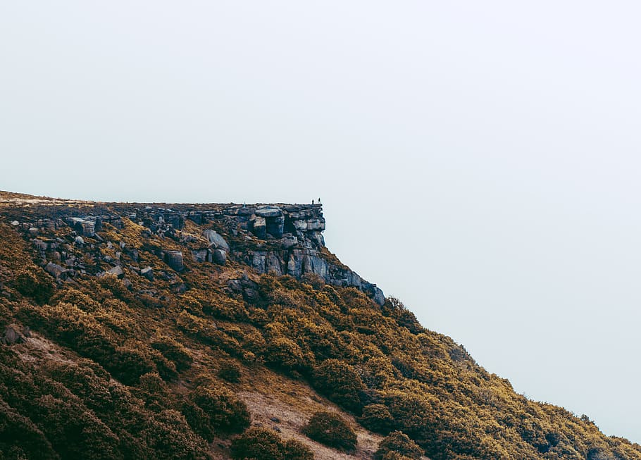 rocky hill during daytime, photography of mountain cliff during daytime HD wallpaper