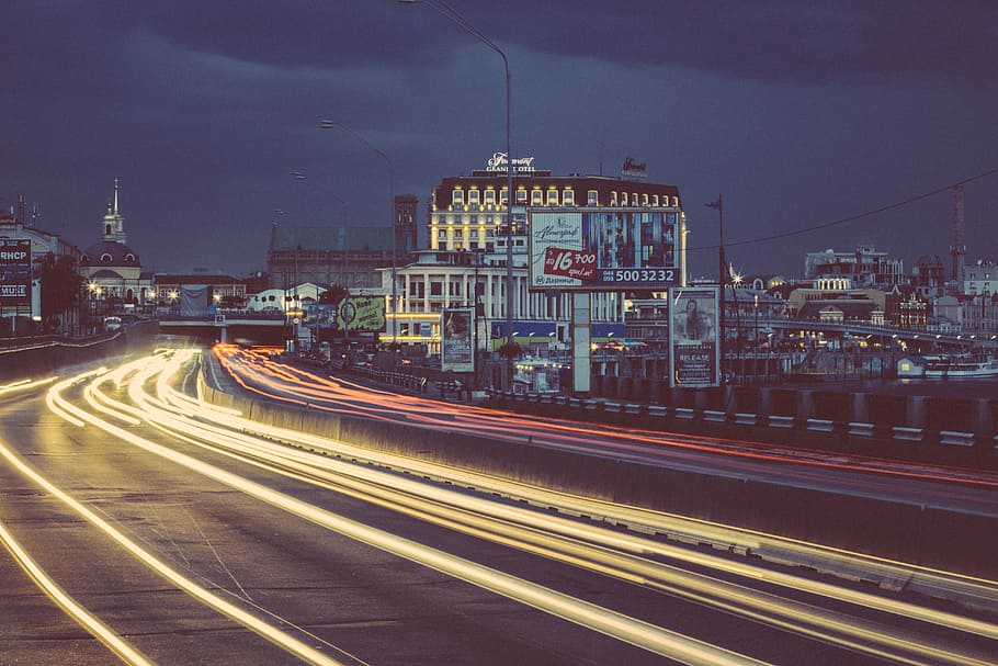 timelapse photography of cars, billboards, bridge, buildings HD wallpaper