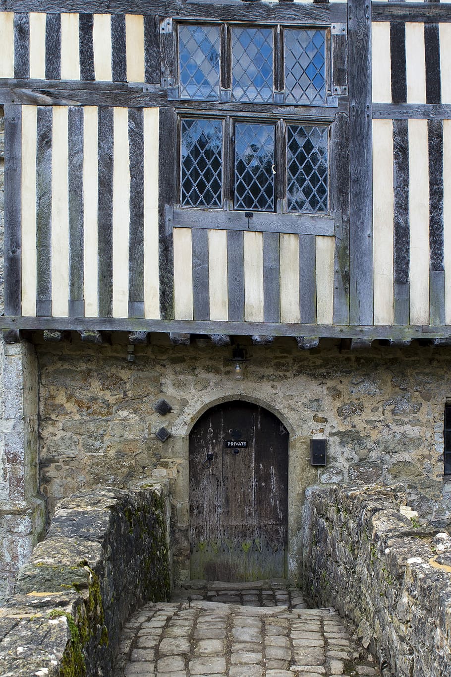 Ightham Mote, medieval moated manor house, doorway, repaired door
