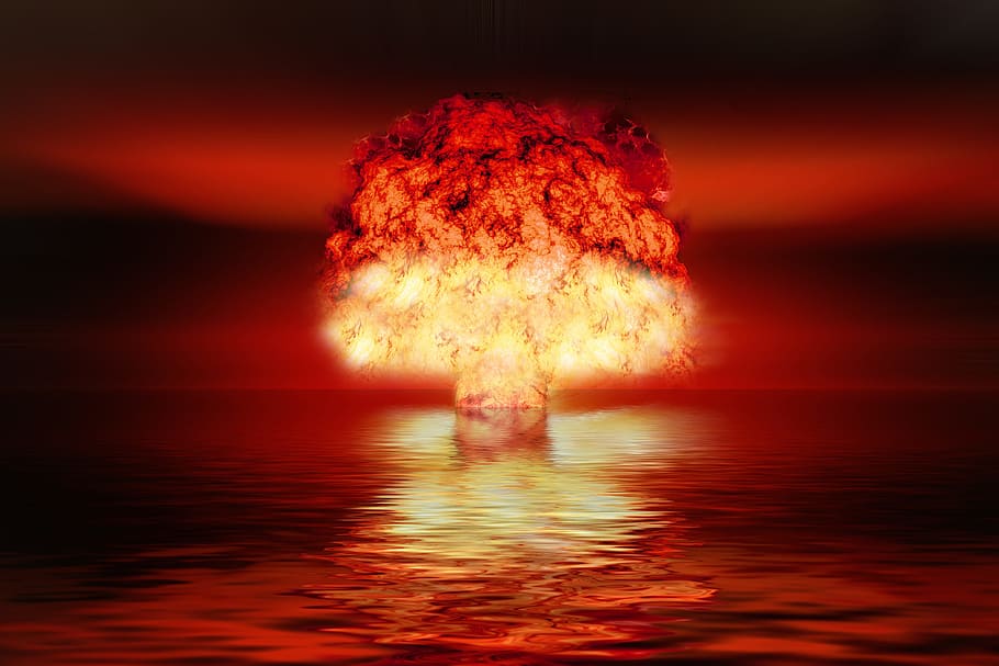 bomb explosion on body of water at night, atomic bomb, nuclear weapons