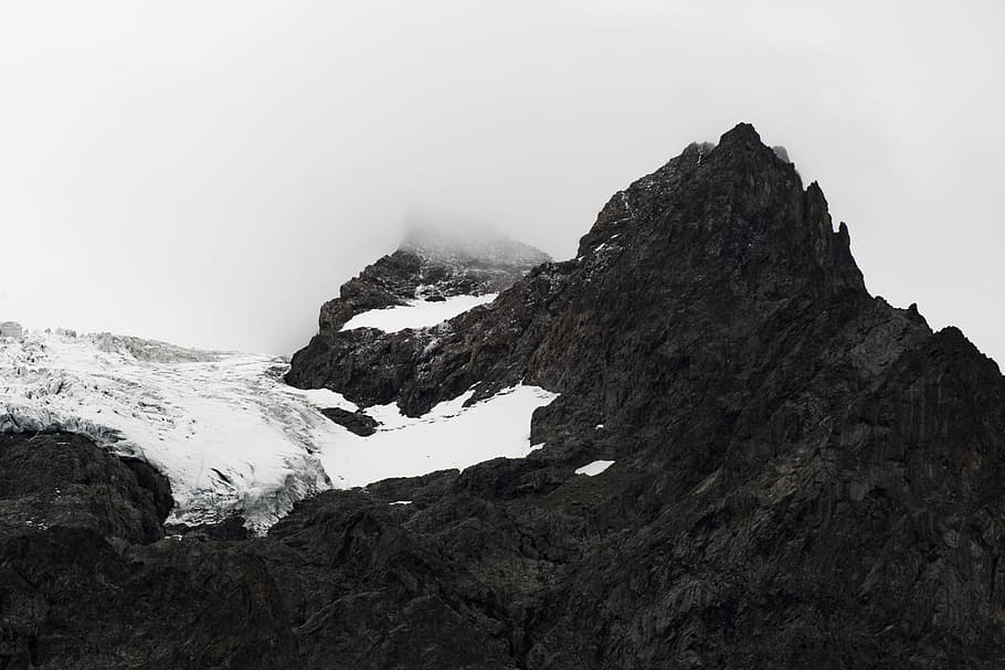 black mountains covered with snow, aerial photography of mountain covered with snow HD wallpaper