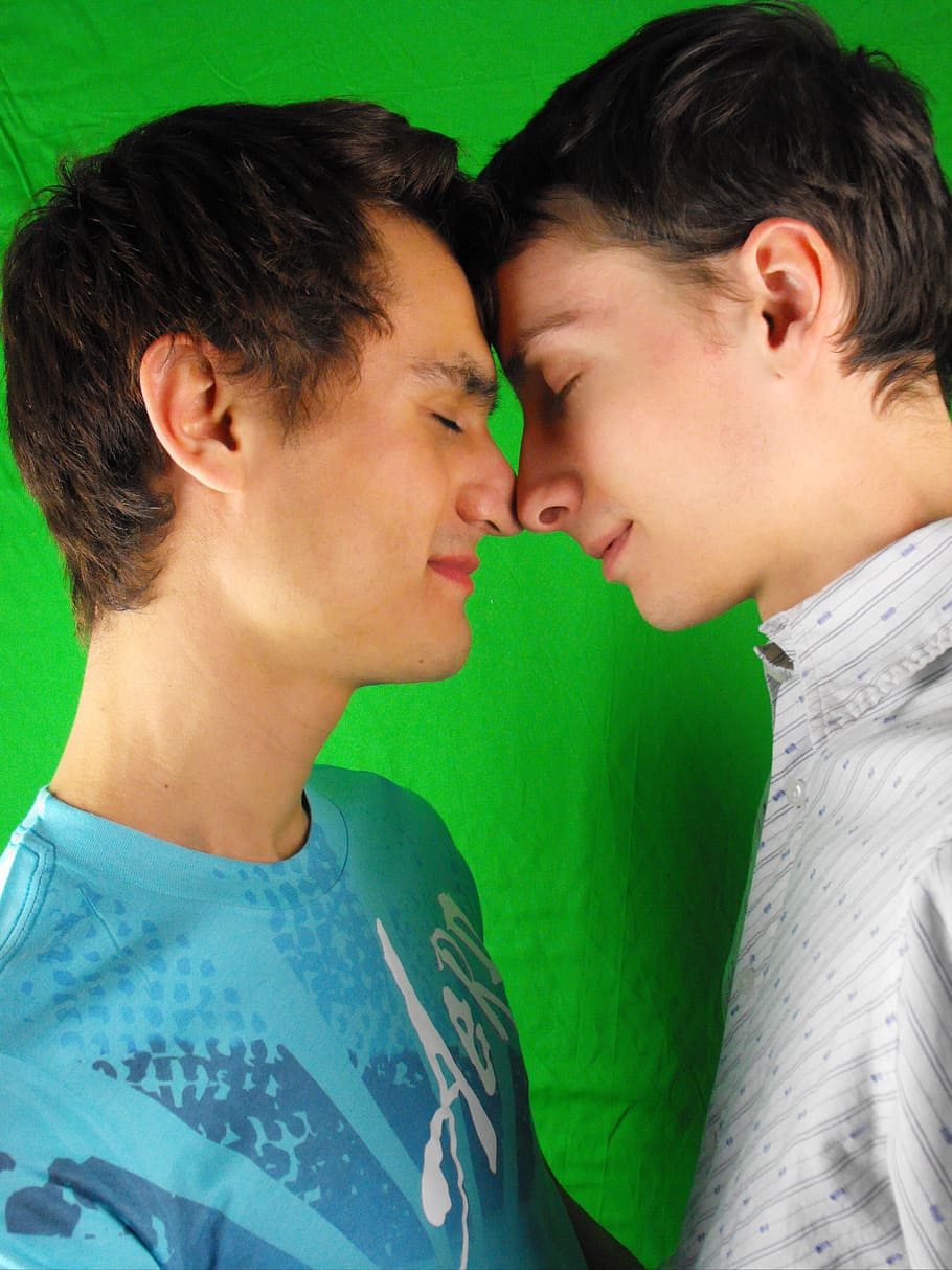 two men wearing white and blue shirts, gay couple, love, young men