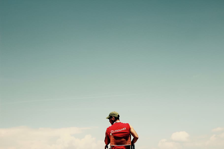 man wearing red shirt under green skies, people, guy, alone HD wallpaper