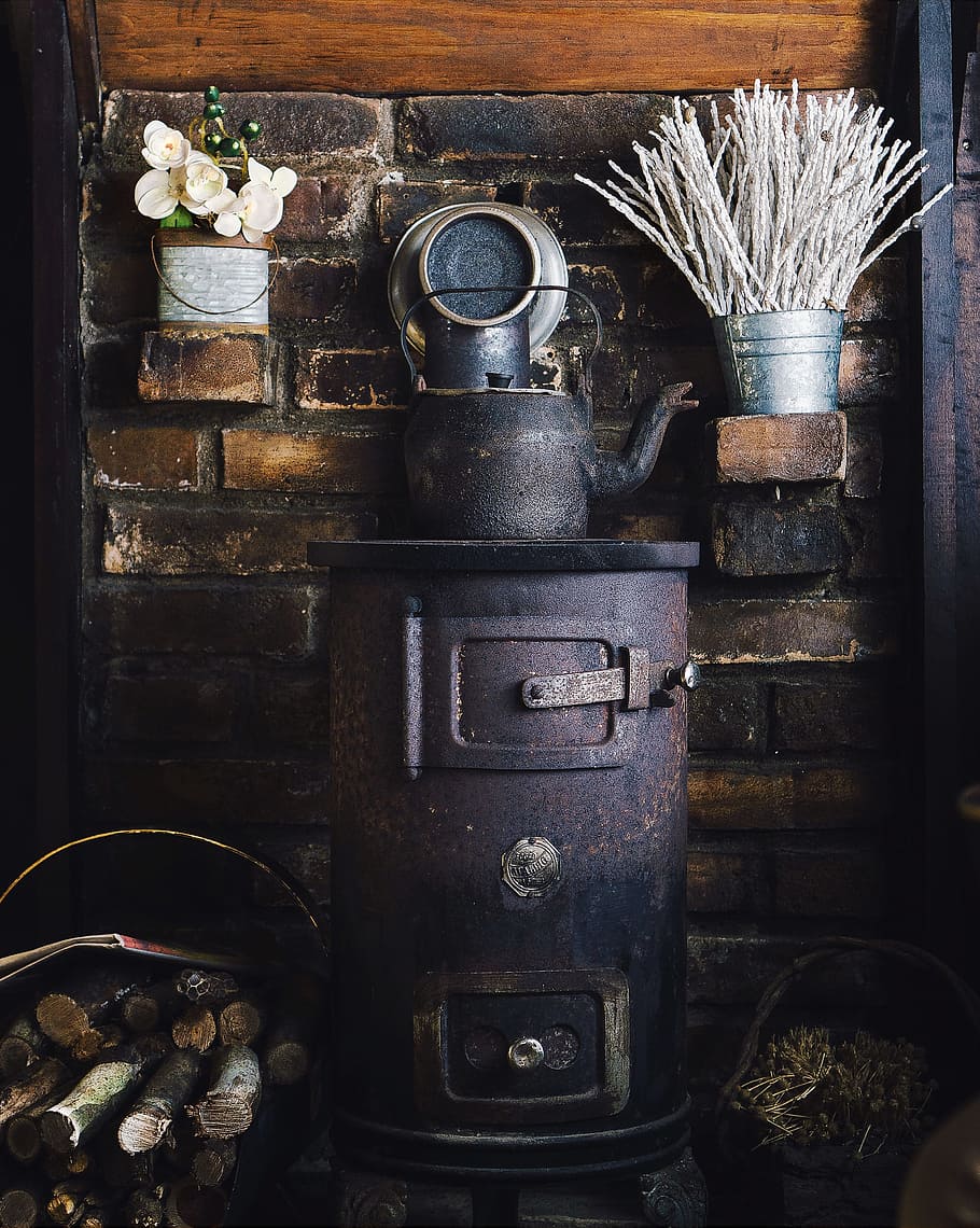 cast-iron teapot on wood burner, cast iron wood burner stove beside pile of firewood HD wallpaper