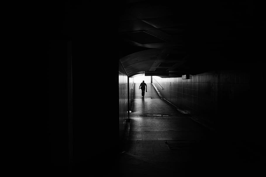 person walking in subway, silhouette photography of person walking hallway HD wallpaper