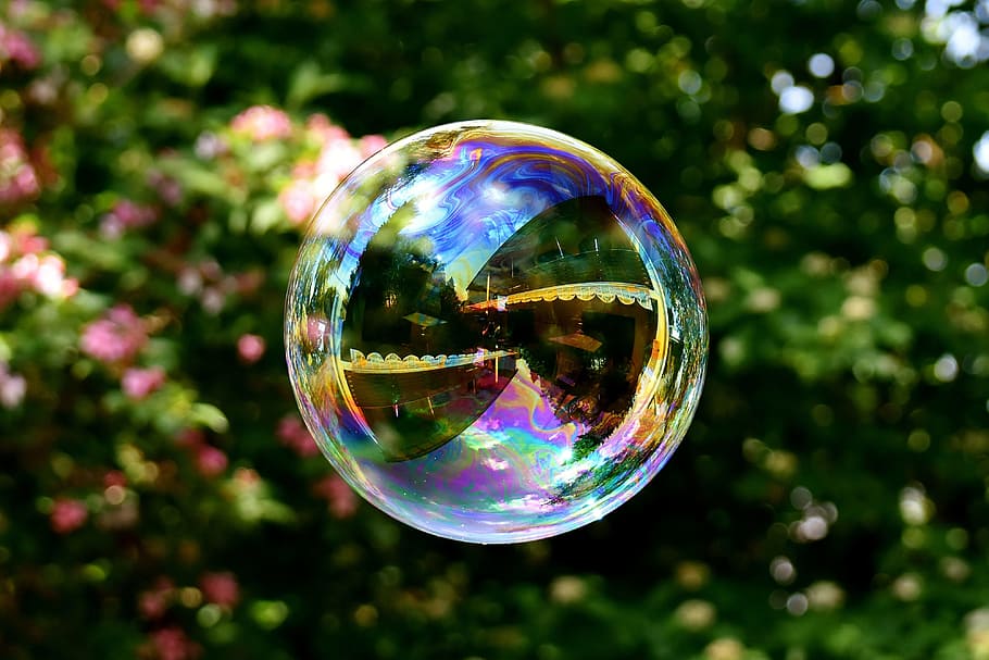 Premium Photo  Beautiful colorful soap bubbles float background.