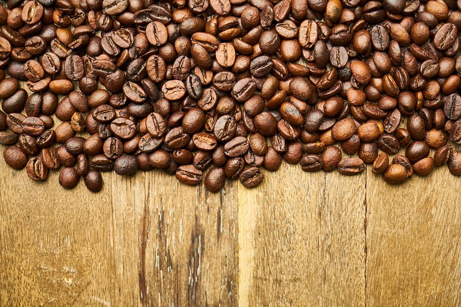 coffee beans on brown table surface, core, seed, kernels, good morning HD wallpaper
