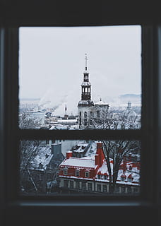 brown and white tower building near smoke at daytime, selective color photography of window view of concrete houses and buildings HD wallpaper