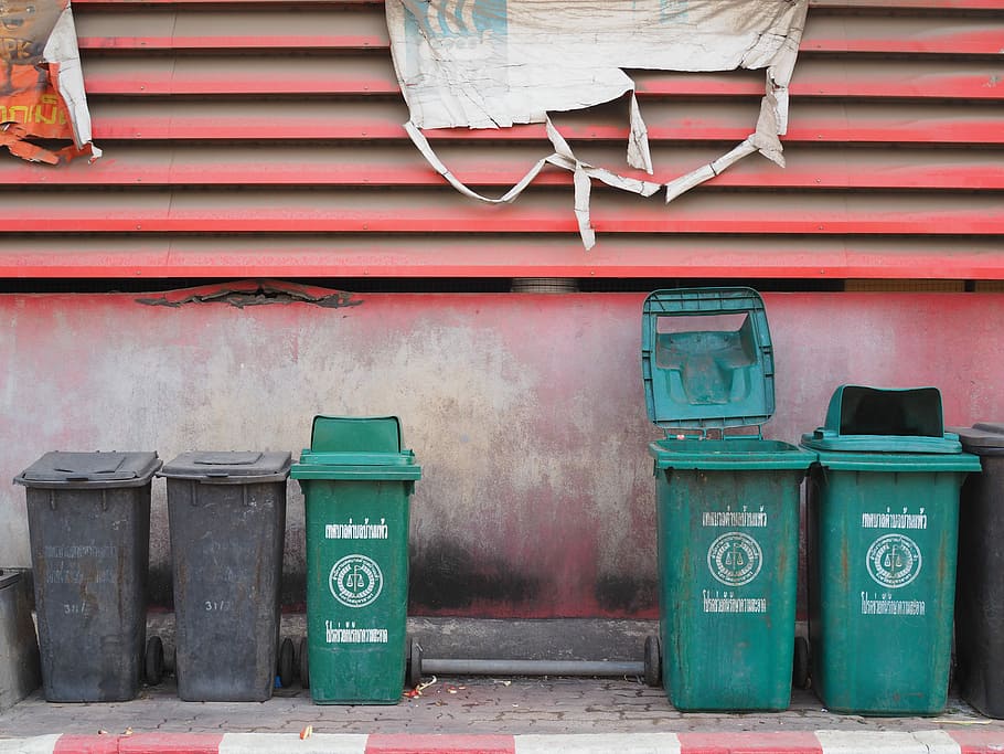 HD wallpaper: green and black plastic trash bin near red wall, wheelie