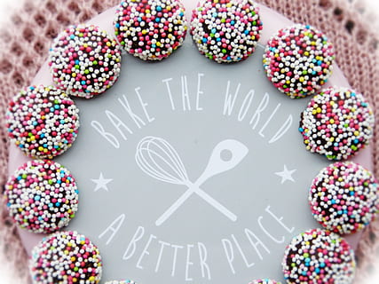 close-up of a pink icing covered cake, bake, motto, world, improve HD wallpaper