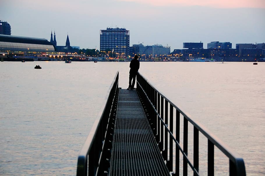silhouette of person standing on metal dock, untitled, pier, city HD wallpaper