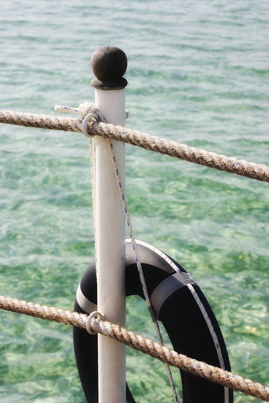 sea, cypress, column, wheel, rope, turquoise, rescue, water HD wallpaper