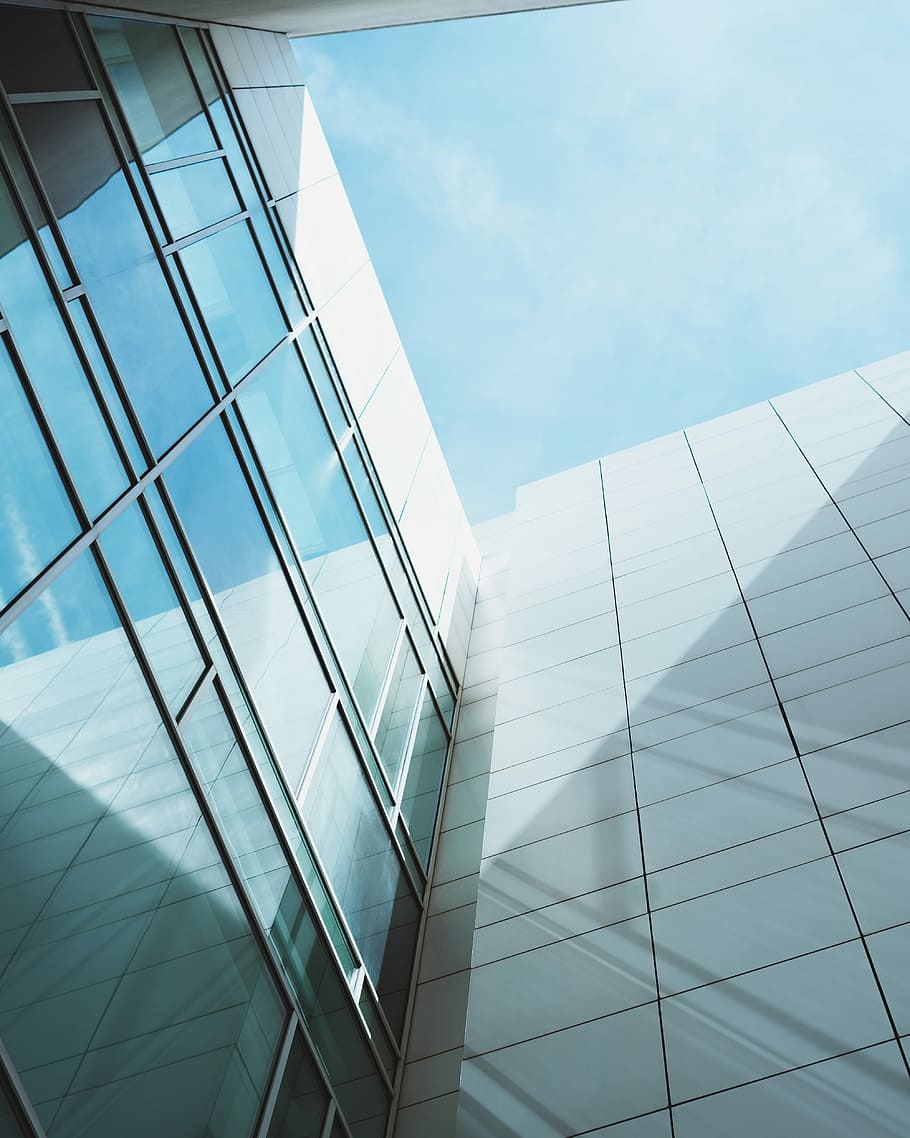 low angle photography of curtain wall building, low-angle photo of glass curtain buildings HD wallpaper