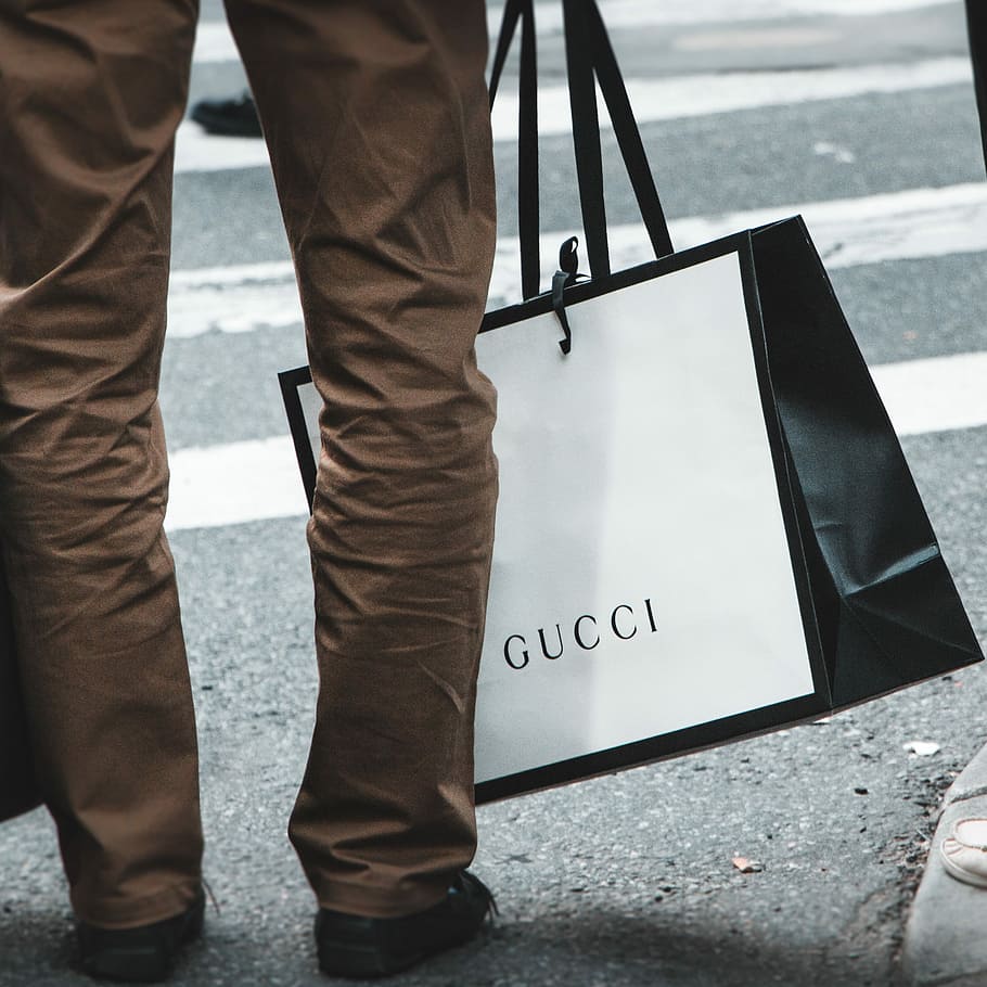 HD wallpaper: gucci down to the socks, person holding white and black Gucci  shopping bag near road | Wallpaper Flare