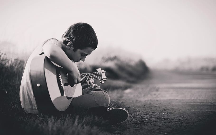 boy playing the guitar on the road, music, musician, musical Instrument