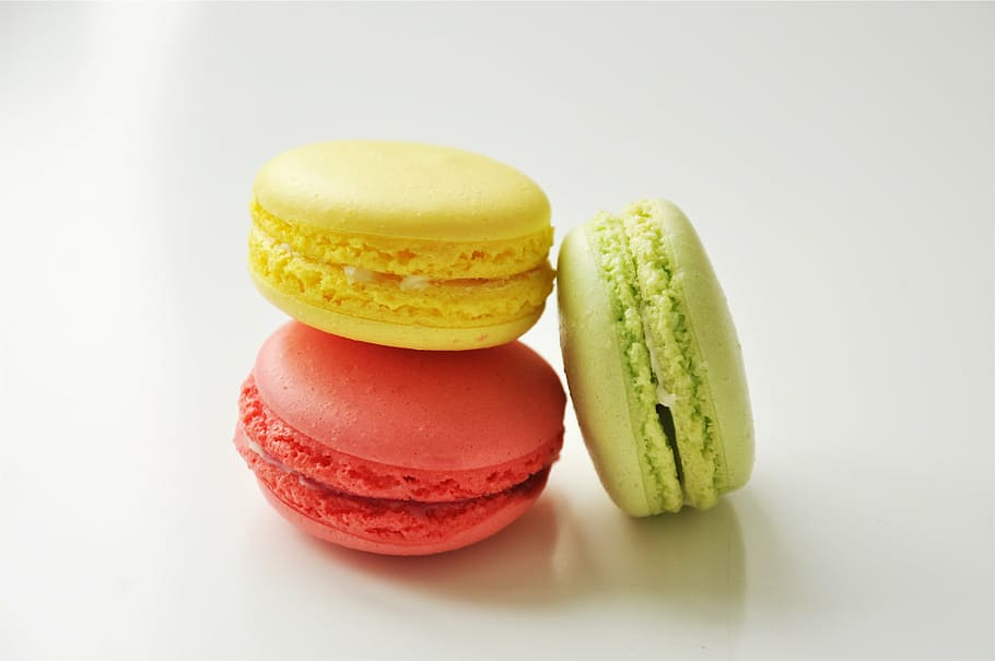 three macaroons on white surface, assorted, green, red, dessert, HD wallpaper