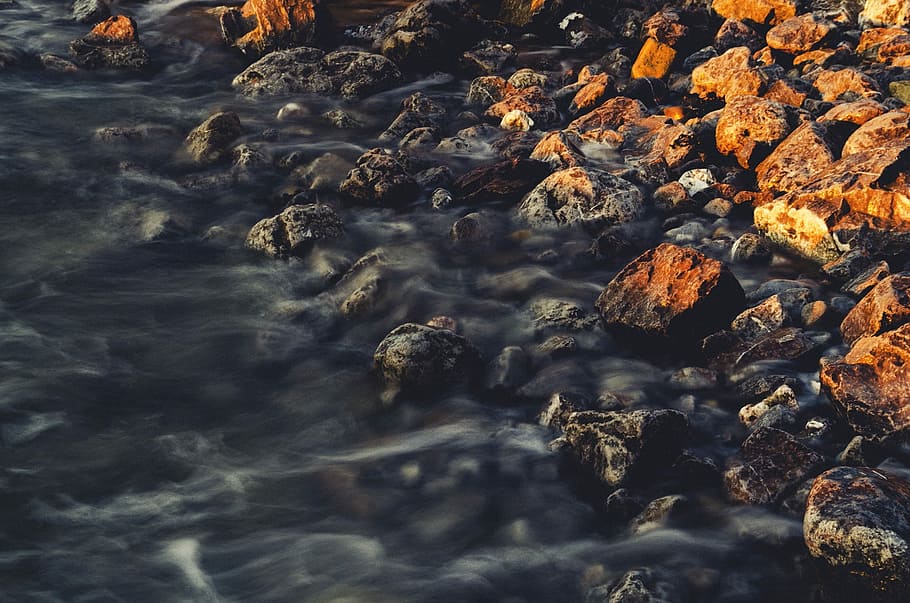 water hitting the rocks, photo of water stream near rocks during daytime, HD wallpaper