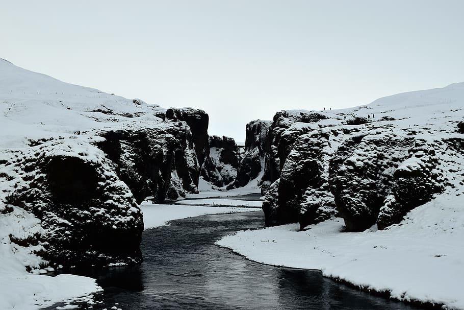 body of water between snowy mountains, river between two hills during winter HD wallpaper