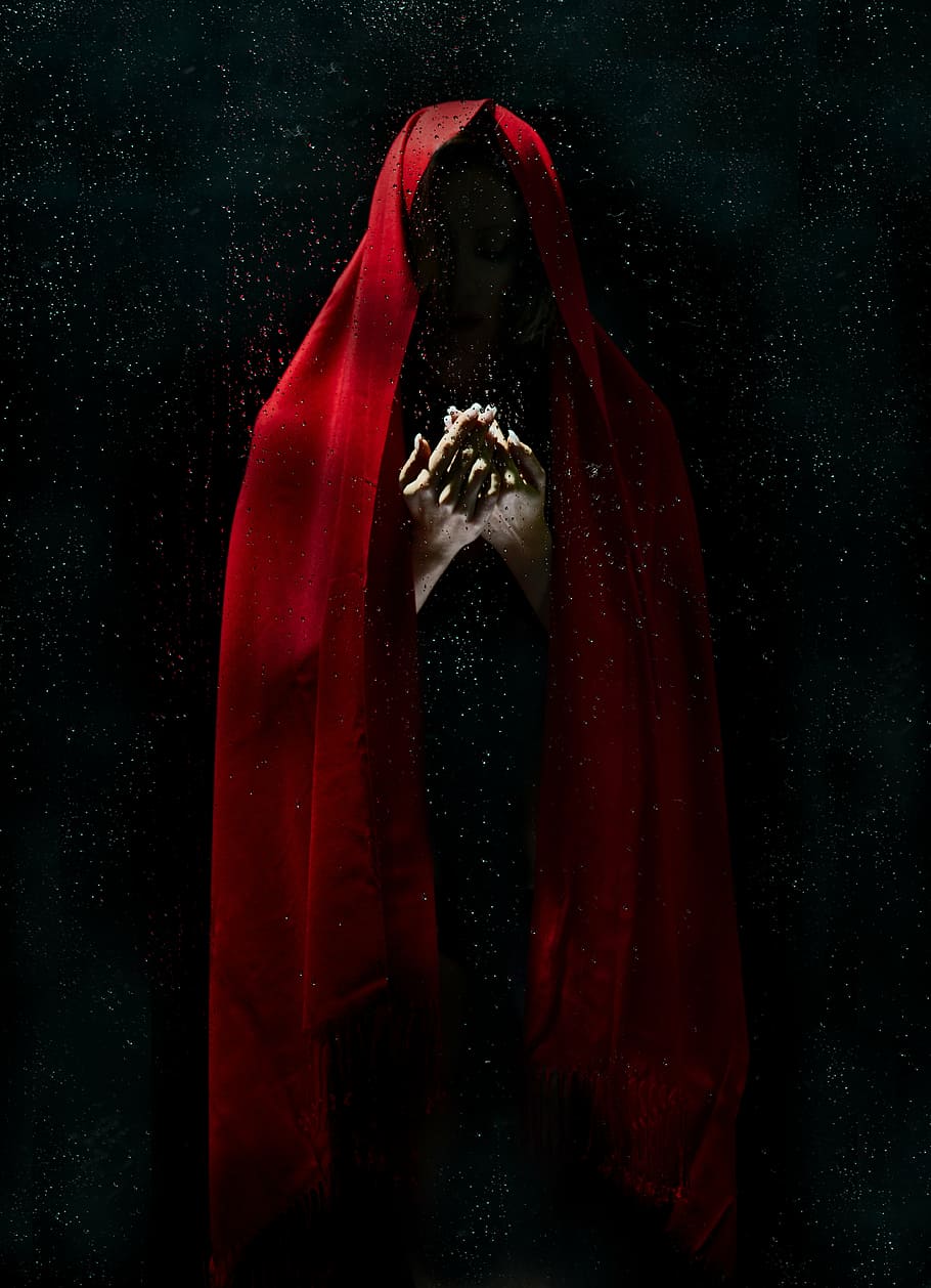 costume, dark, eerie, hands, scary, one person, red, studio shot