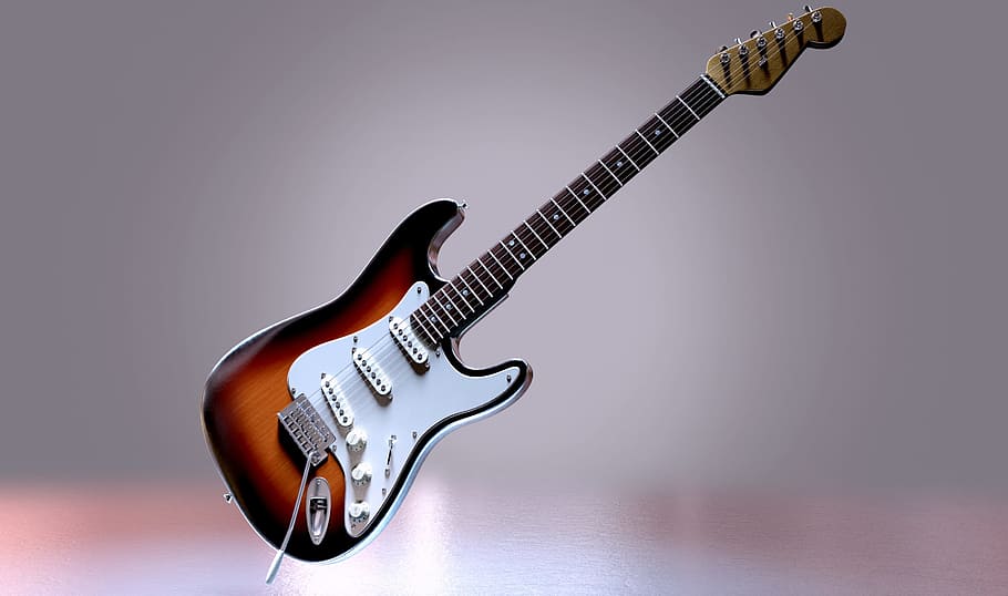 photo of brown stratocaster-style electric guitar, stringed instrument