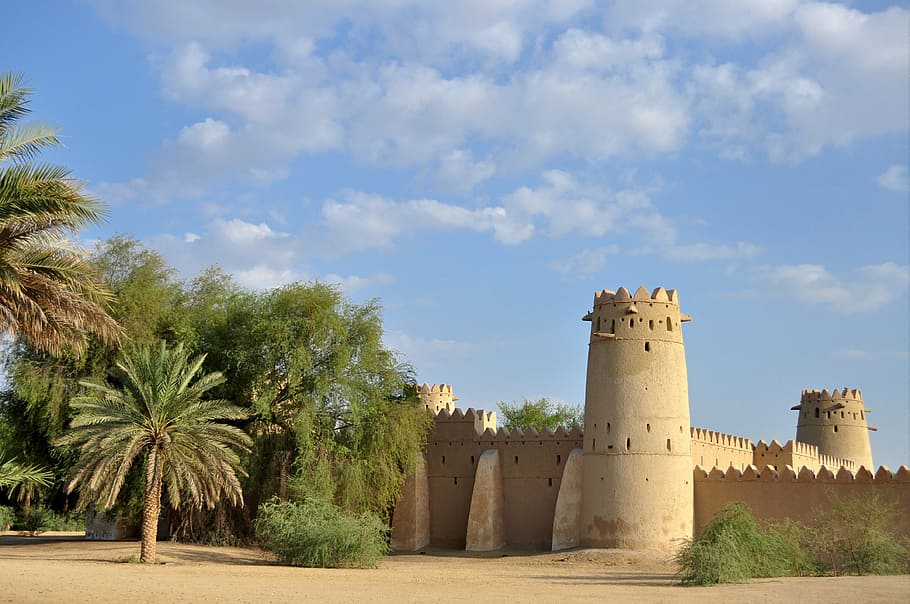 white concrete castle during daytime, old fort, jahili fort, al ain