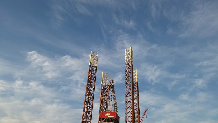 low rise photo of a four brown metal stands, sky, clouds, drill HD wallpaper