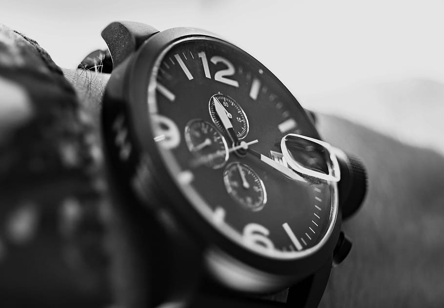 close up photograph of person wearing round bezel chronograph watch, HD wallpaper