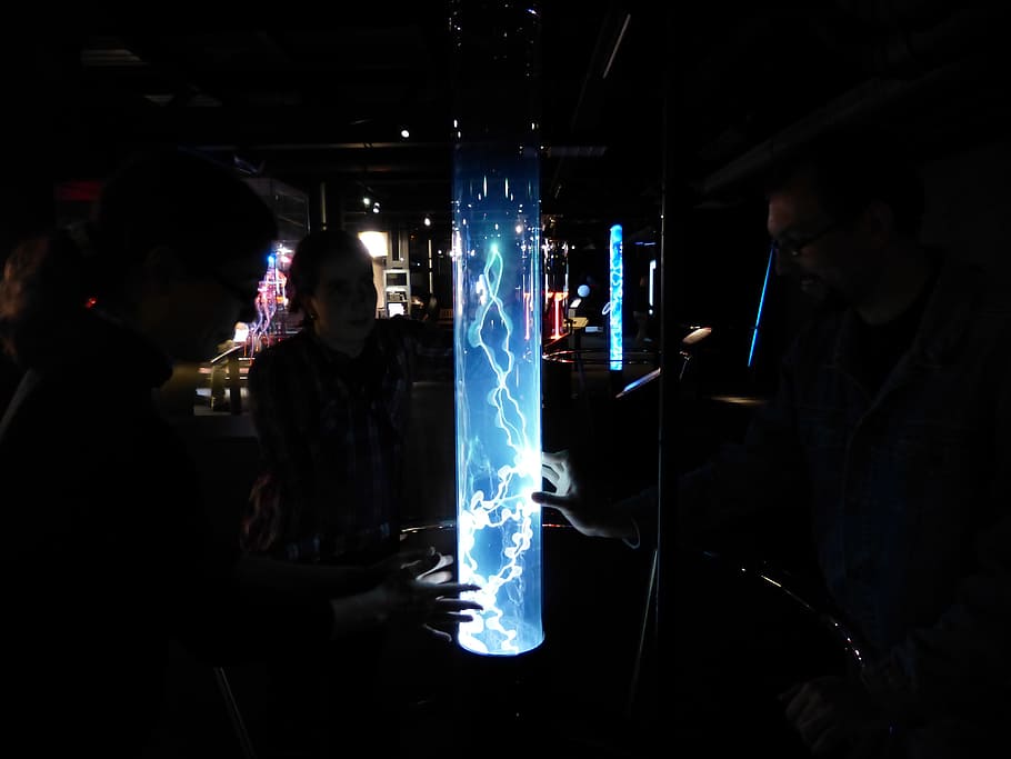 group of people touching plasma light, Plume, Plasma Lamp, plasma plume