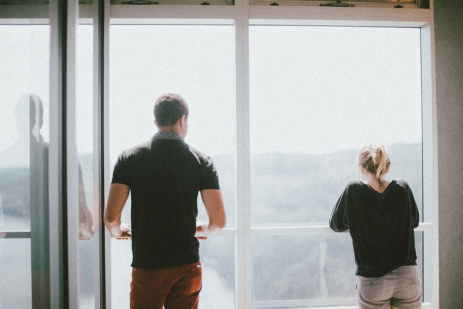 man and woman leaning against window pane, building, glass HD wallpaper