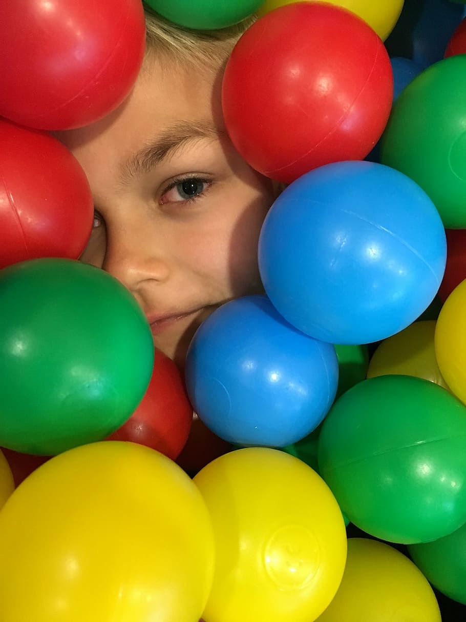 child, ball, fun, face, game, colored, multi colored, one person HD wallpaper