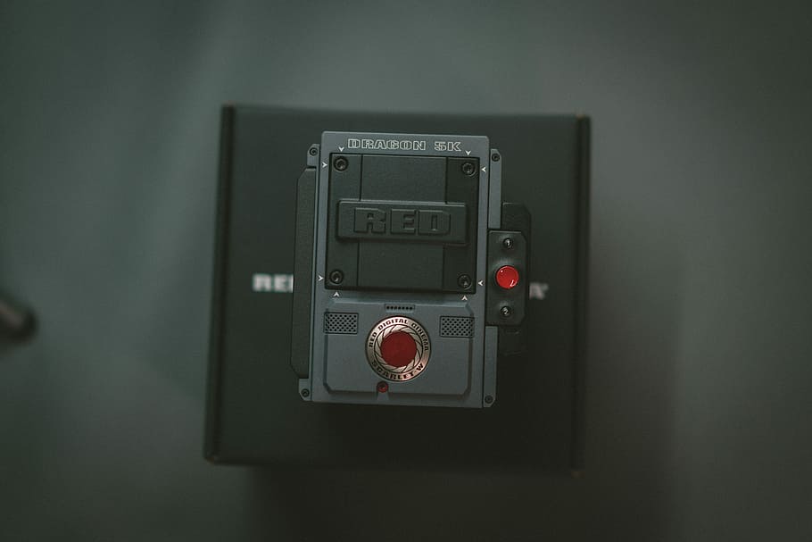 black and gray remote on black box, turned-off black and grey Red machine HD wallpaper