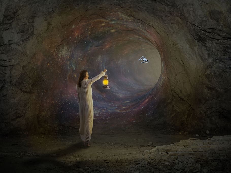 person holding lamp inside cave, worm hole, voltage, hope, illusion HD wallpaper