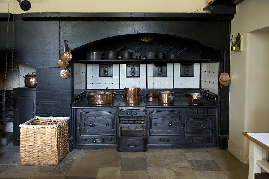 gold steel cookware set on the kitchen, kitchen cabinet, victorian cooking range