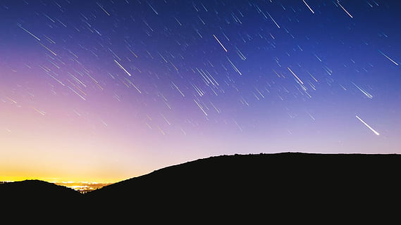 photo of meteor shower on golden hour, sky, astronomy, space HD wallpaper