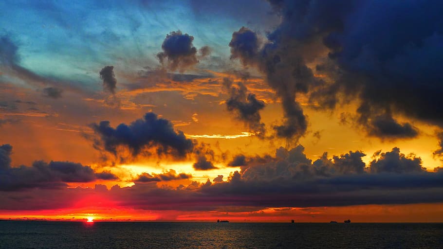 orange cloudy sky at golden hour, light and dark, the sunset HD wallpaper