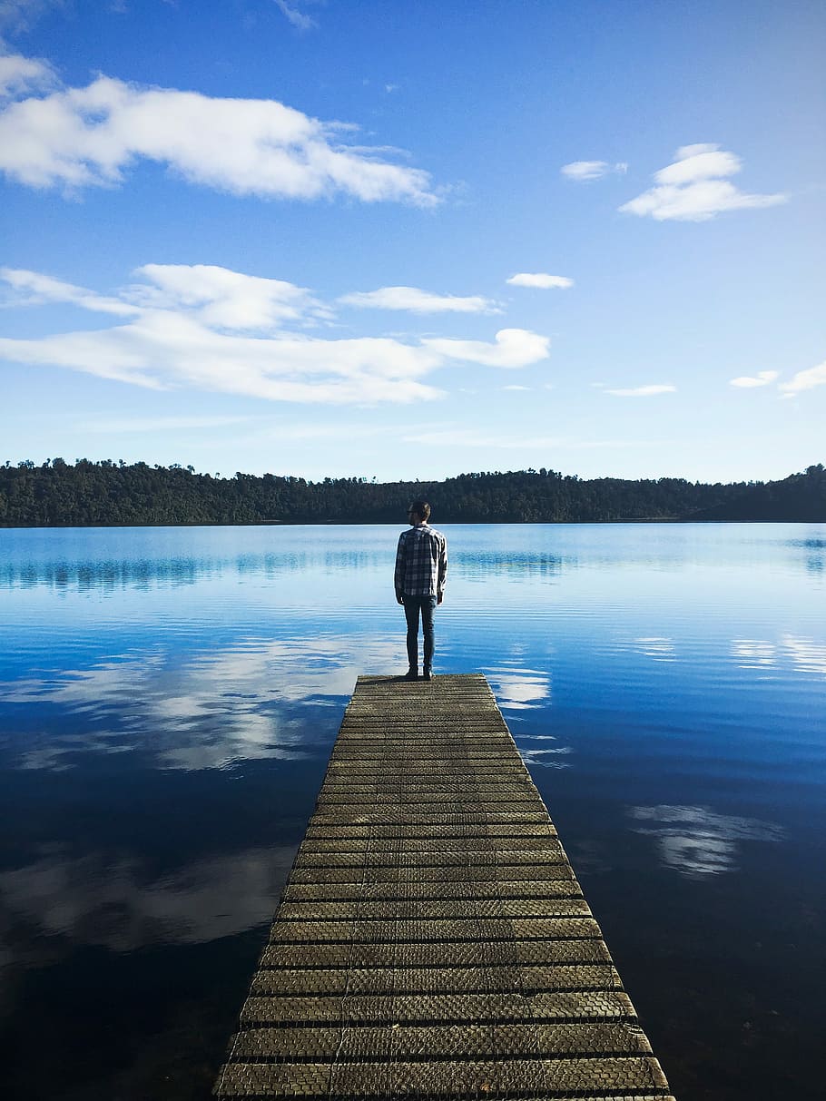 photo of man standing on bridge, lake, nature, outdoors, men HD wallpaper