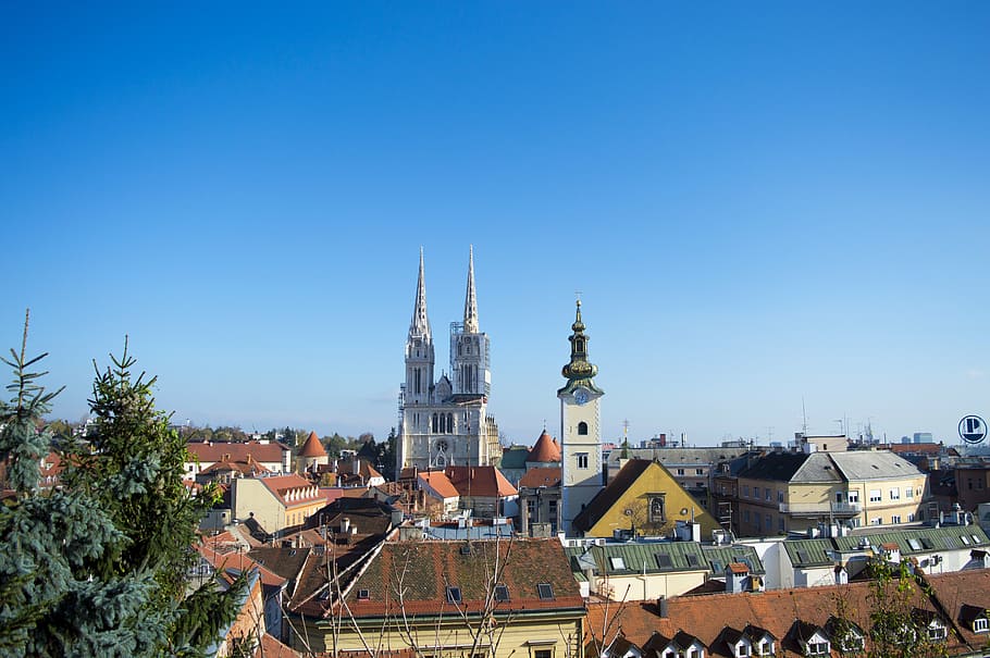 white cathedral near buildings, zagreb, croatia, city, europe