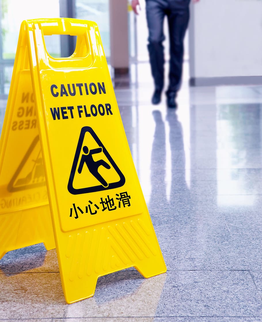 yellow caution wet floor sign on floor, Heads Up, Slip, mark