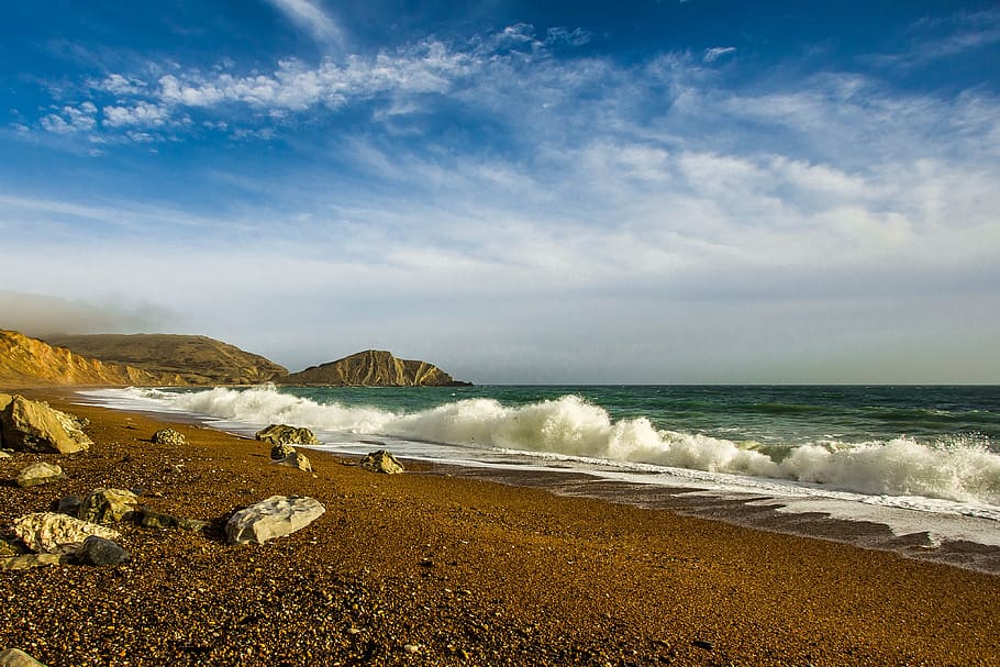 brown sand near body of water, ocean, seascape, england, waves HD wallpaper