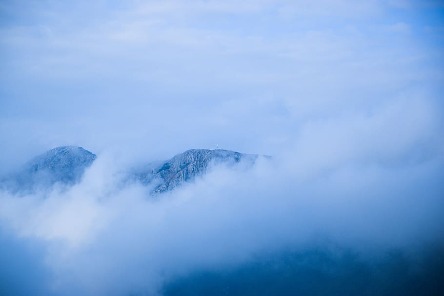 mountain covered with fog, fog and snow-covered mountain aerial photo HD wallpaper