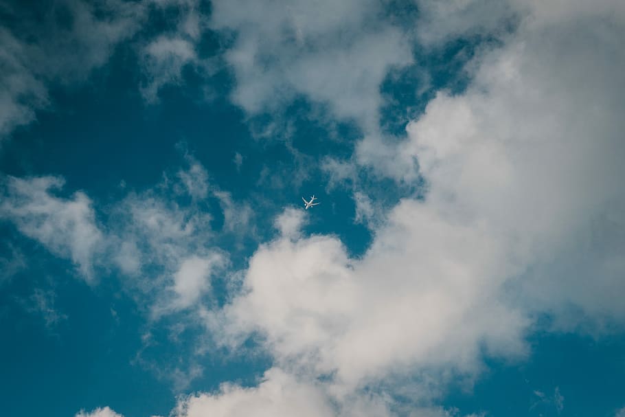 aerial photography of passenger plane at daytime, photography of clouds HD wallpaper