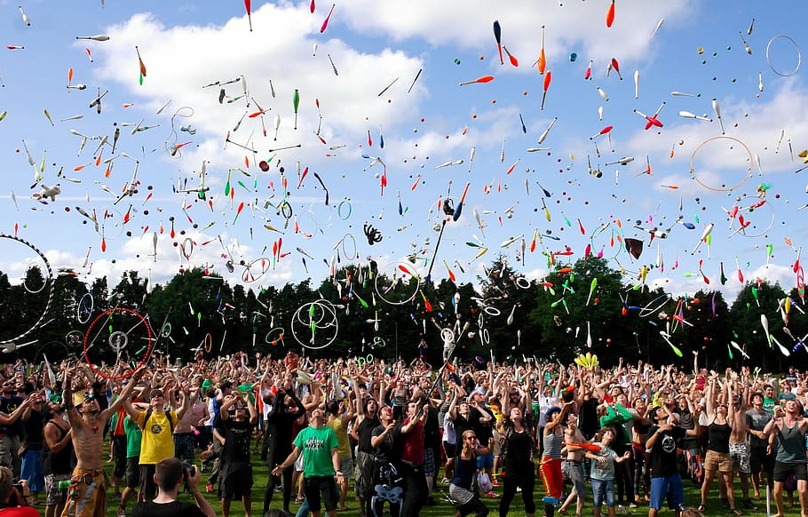 people throwing pins, juggler, jugglers, toss up, juggling club