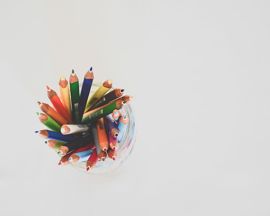 colored pencils in top view photography, top view photo of colored pencils in glass jar HD wallpaper